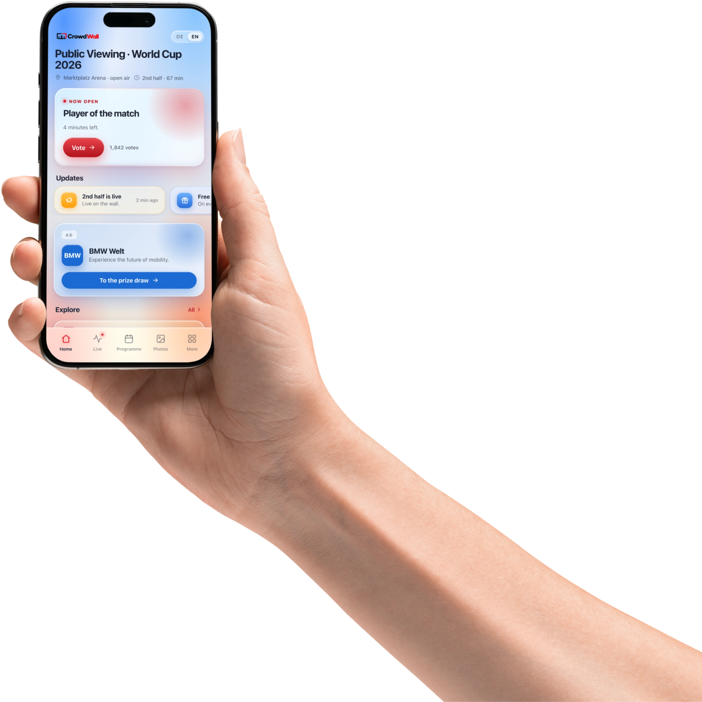 A fan's hand holding a phone showing the CrowdPortal start screen at a public viewing (demo screen)